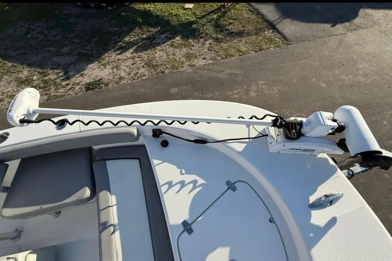 Slide: The Image of 2023 Falcon Boats F22 with Minn Kota trolling motor on deck. - 23