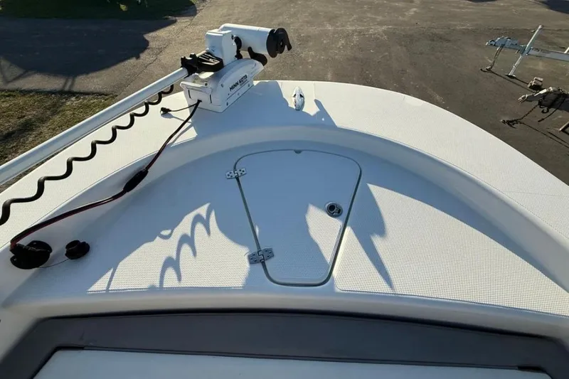 Slide: The Image of 2023 Falcon Boats F22 deck with mounted trolling motor, showcasing sleek design and functionality. - 24