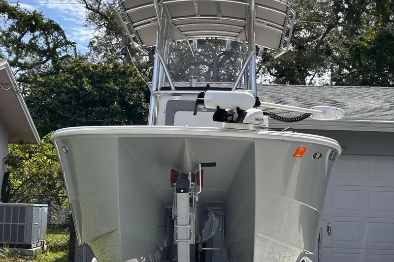 Slide: The Image of 2023 Falcon Boats F22, sleek design, parked outdoors, showcasing modern features and craftsmanship. - 3