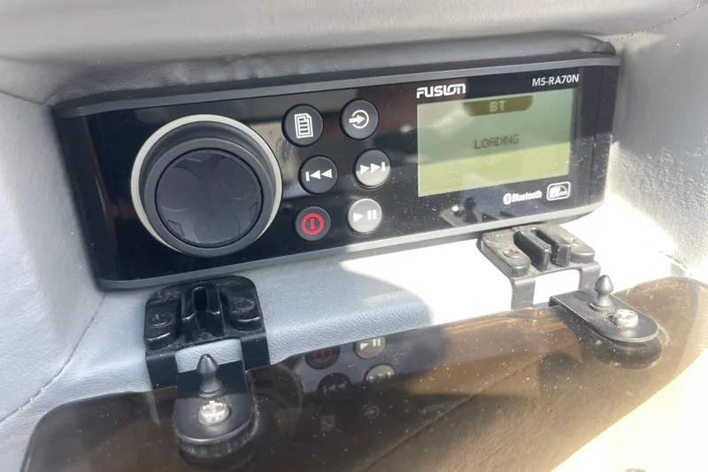 Slide: The Image of Fusion MS-RA70N stereo system in a 2004 Cobalt 282 boat, displaying Bluetooth loading. - 25