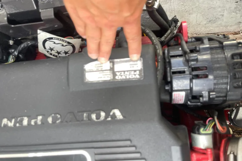 Slide: The Image of Close-up of a 2004 Cobalt 282 engine with Volvo Penta branding. - 27