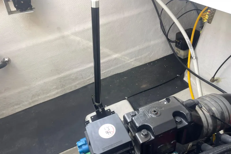 Slide: The Image of Engine compartment of a 2004 Cobalt 282 boat, showing mechanical components and wiring. - 30