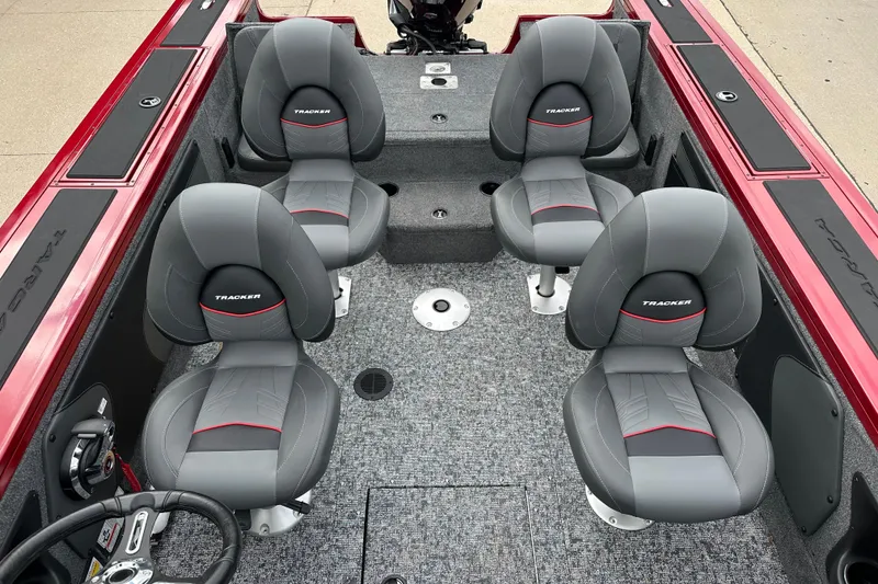 Slide: The Image of 2026 Tracker Targa V-19 Combo boat interior with Minn Kota trolling motor. - 9