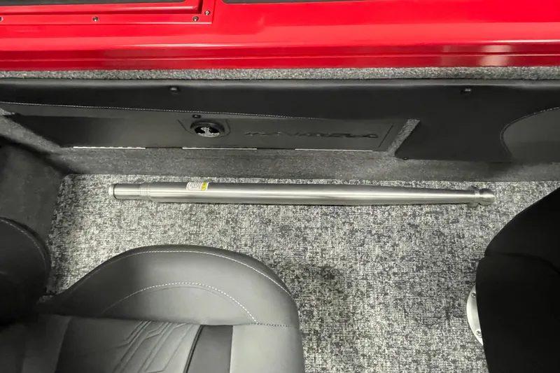 Slide: The Image of 2026 Tracker Targa V-19 Combo boat interior with foot pedal and wiring details. - 10
