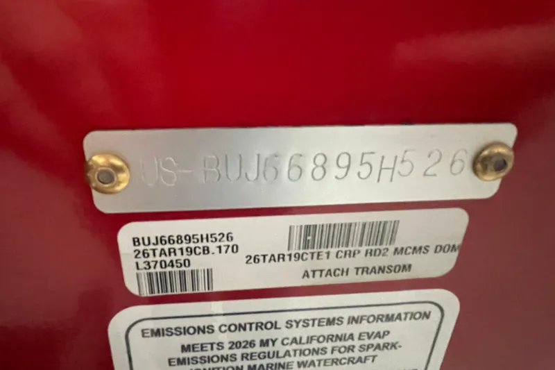 Slide: The Image of 2026 Tracker Targa V-19 Combo boat interior with rod storage and steering console. - 20