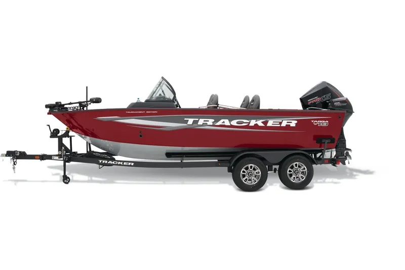 Slide: The Image of 2026 Tracker Targa V-19 Combo boat interior with steering console and seating. - 21