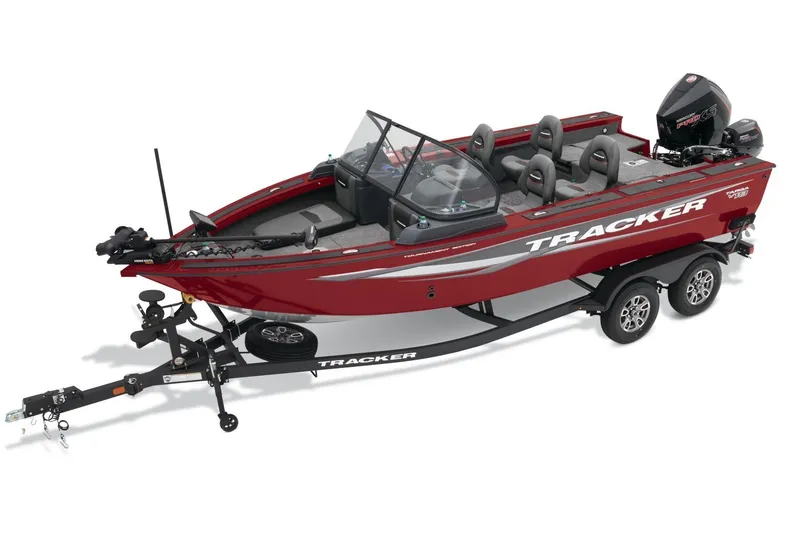 Slide: The Image of 2026 Tracker Targa V-19 Combo boat console with controls and key. - 24