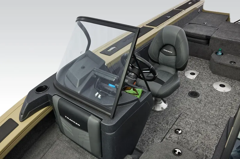 Slide: The Image of 2026 Tracker Targa V-19 Combo boat interior with steering console and seating. - 21