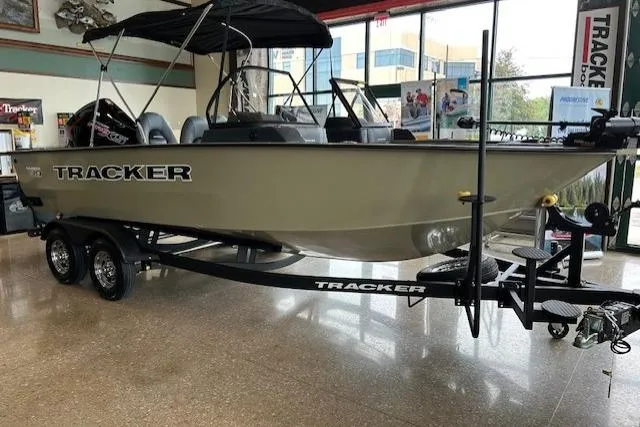 The Image of 2026 Tracker Targa V-19 Combo boat displayed indoors on a trailer. - 0