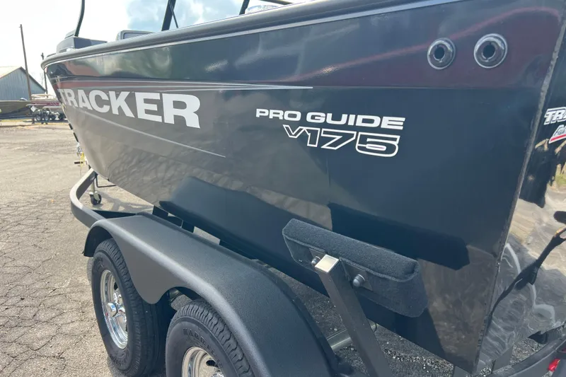 Slide: The Image of 2026 Tracker Pro Guide V-175 Combo boat on trailer, side view. - 13