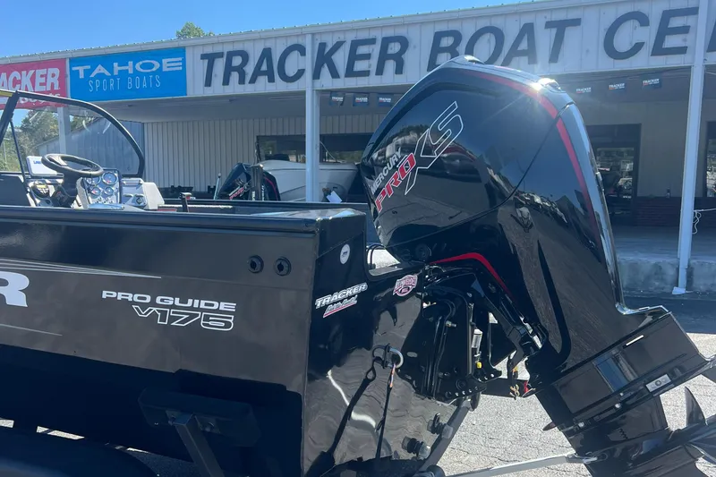 Slide: The Image of 2026 Tracker Pro Guide V-175 Combo boat with Mercury Pro XS engine at dealership. - 3