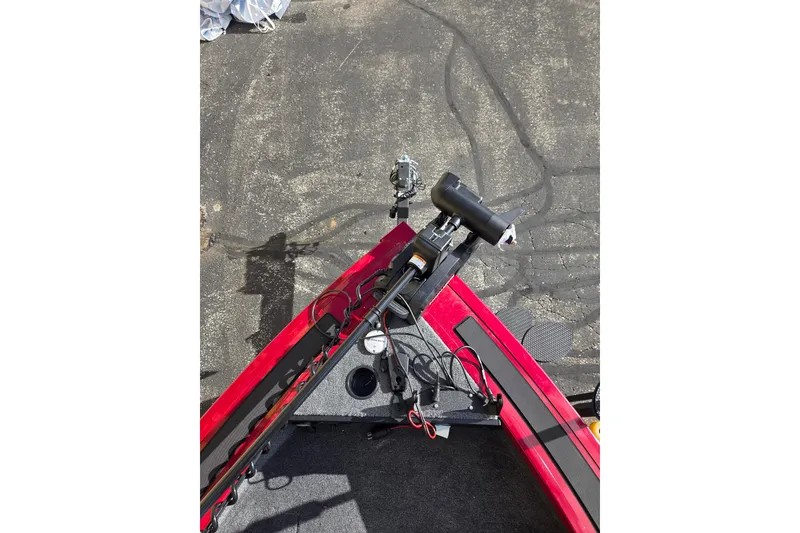 Slide: The Image of 2026 Tracker Targa V-19 Combo boat deck with fishing equipment and cables. - 3