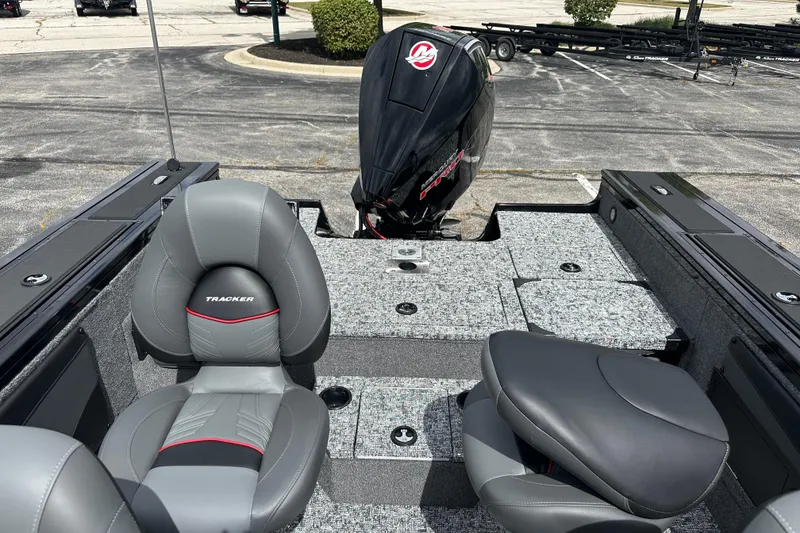 Slide: The Image of 2026 Tracker Targa V-19 Combo boat interior layout, featuring seating and storage compartments. - 6