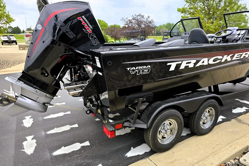 Slide: The Image of 2026 Tracker Targa V-19 Combo boat on trailer, featuring powerful outboard motor. - 3