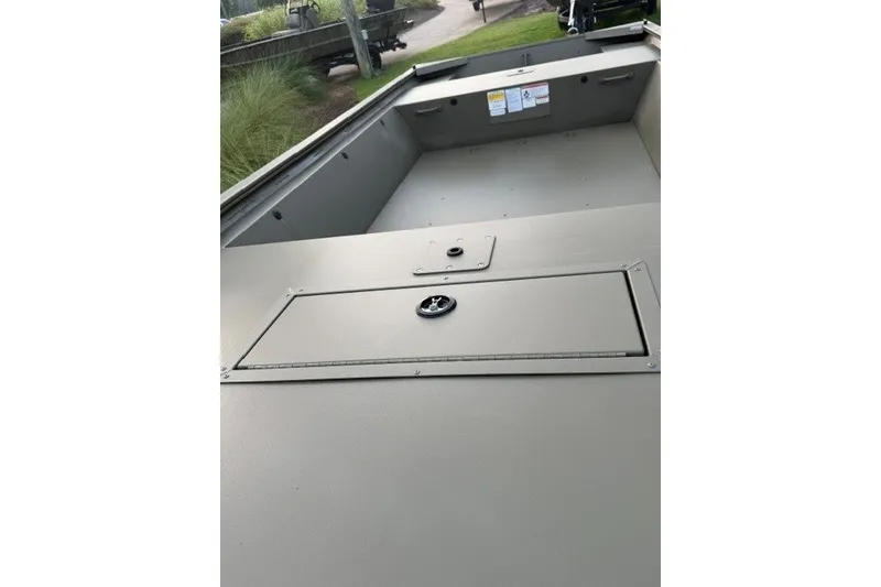 Slide: The Image of 2026 Tracker Grizzly 1648 Utility boat interior, showcasing spacious and durable design. - 6