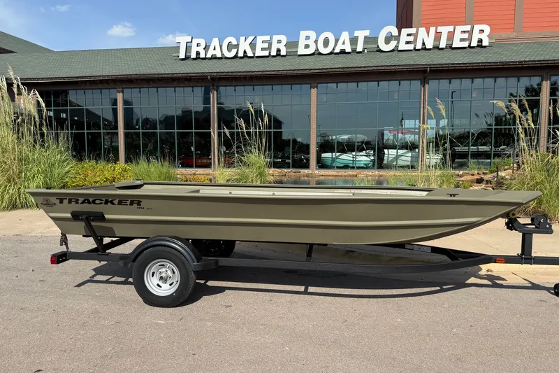 Slide: The Image of 2026 Tracker Grizzly 1754 Utility boat on trailer at Tracker Boat Center. - 4