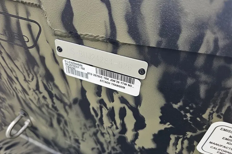 Slide: The Image of 2026 Tracker Grizzly 2072 CC boat identification plate with camouflage pattern. - 19