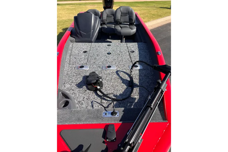 Slide: The Image of 2026 Tracker Pro Team 175 Crappie Edition boat interior with gray carpet and seating. - 4