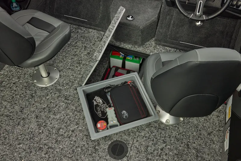 Slide: The Image of Interior of 2026 Tracker Targa V-19 Combo with storage compartment. - 28