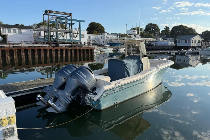 Slide: The Image of 2017 Grady White 257 Fisherman boat docked with twin Yamaha engines. - 3
