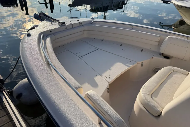 Slide: The Image of 2017 Grady White 257 Fisherman boat interior, featuring spacious seating and sleek design. - 6