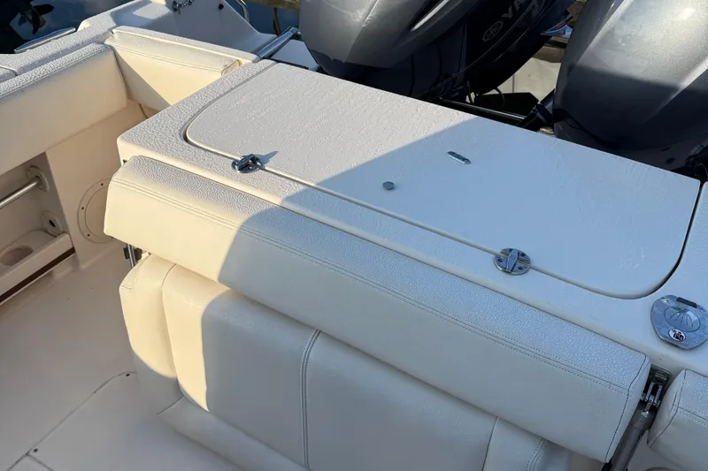 Slide: The Image of 2017 Grady White 257 Fisherman boat interior with seating and engine view. - 8