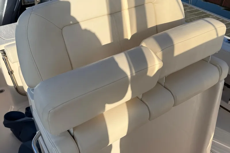 Slide: The Image of Cream-colored seating on a 2017 Grady White 257 Fisherman boat. - 9