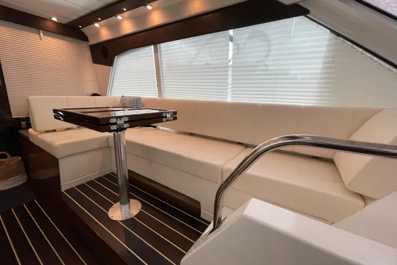 Slide: The Image of Helm station of 2012 Cruisers Yachts 48 Cantius with modern navigation equipment. - 25