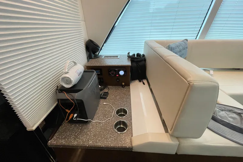 Slide: The Image of Luxurious interior of 2012 Cruisers Yachts 48 Cantius with elegant seating and table. - 29