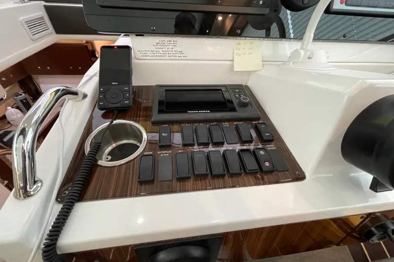 Slide: The Image of Luxurious interior of 2012 Cruisers Yachts 48 Cantius with elegant seating and table. - 32