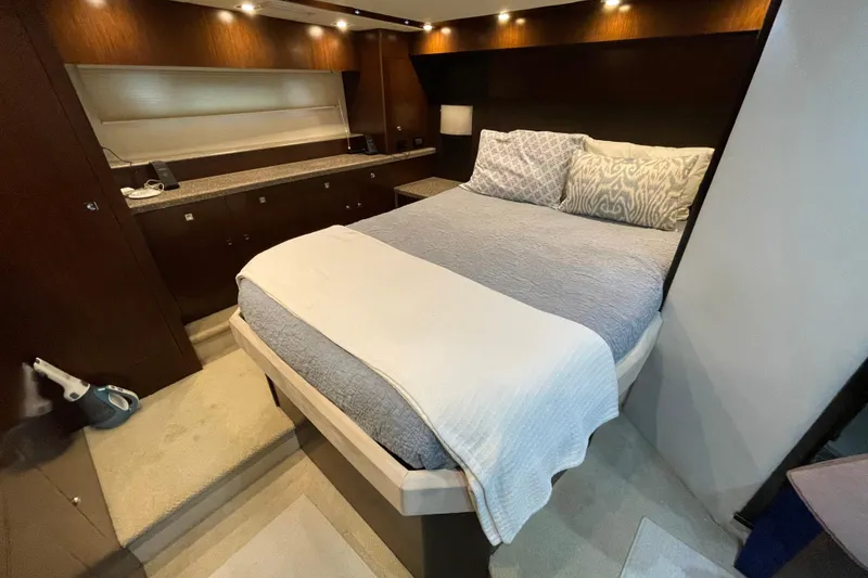 Slide: The Image of Luxurious interior of 2012 Cruisers Yachts 48 Cantius with modern kitchen and seating area. - 44