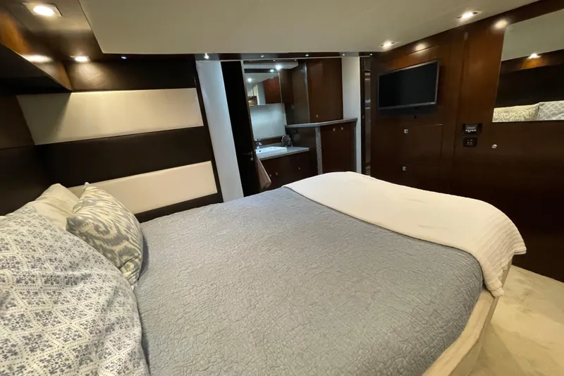 Slide: The Image of Luxurious 2012 Cruisers Yachts 48 Cantius kitchen with modern appliances and sleek design. - 46