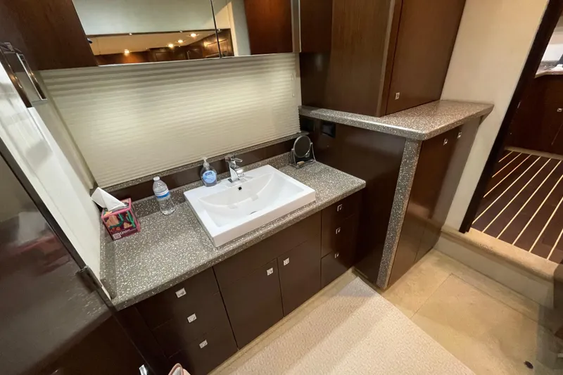 Slide: The Image of Luxurious bedroom interior of 2012 Cruisers Yachts 48 Cantius with ensuite bathroom. - 49