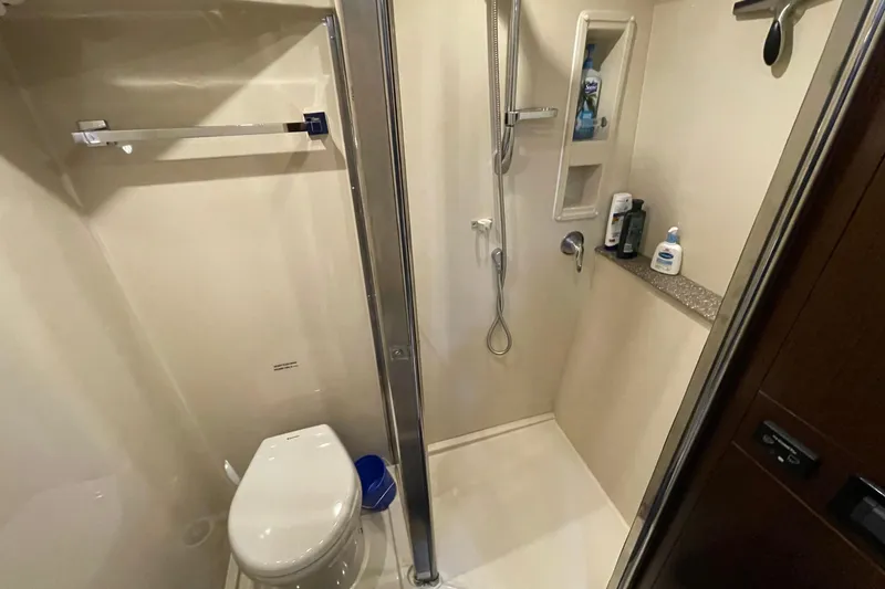 Slide: The Image of Luxurious bedroom interior of 2012 Cruisers Yachts 48 Cantius with modern decor and amenities. - 50