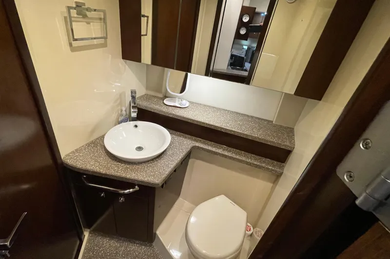 Slide: The Image of Washing machine inside 2012 Cruisers Yachts 48 Cantius, compact and efficient design. - 55