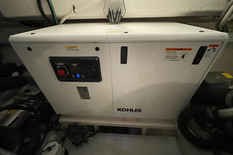 Slide: The Image of Engine room of 2012 Cruisers Yachts 48 Cantius with battery setup and wiring. - 60