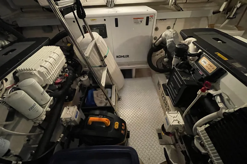 Slide: The Image of Engine room of 2012 Cruisers Yachts 48 Cantius with Kohler generator and Volvo components. - 65