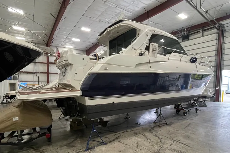 Slide: The Image of 2012 Cruisers Yachts 48 Cantius in indoor storage, showcasing sleek design and modern features. - 70