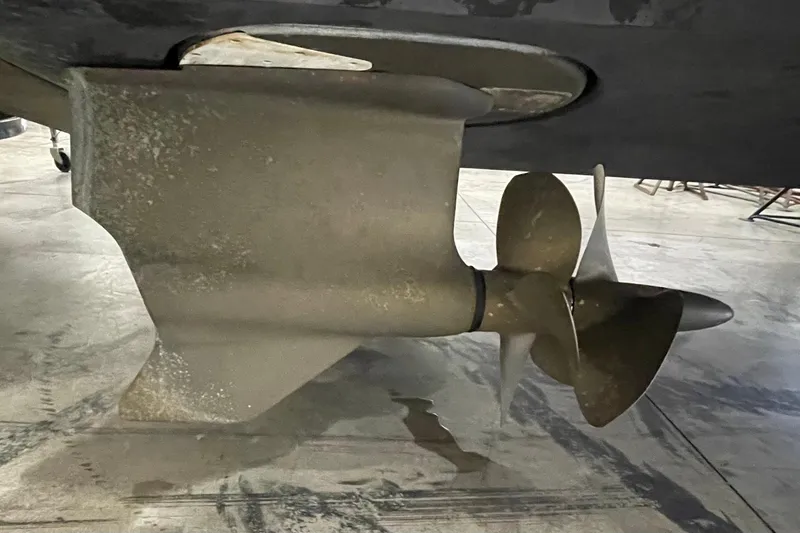 Slide: The Image of Propeller of 2012 Cruisers Yachts 48 Cantius in a maintenance facility. - 71