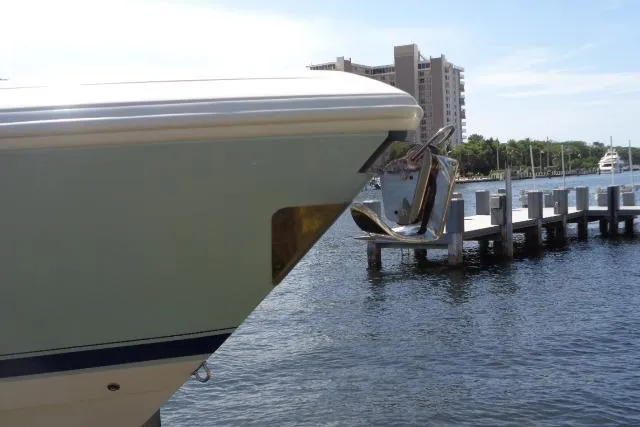 Slide: The Image of Bow of 2020 Intrepid 345 Nomad FE docked near waterfront buildings. - 3