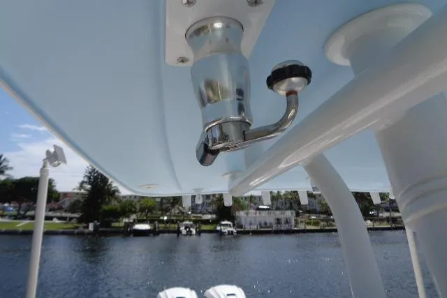 Slide: The Image of 2020 Intrepid 345 Nomad FE boat detail with waterway background. - 30