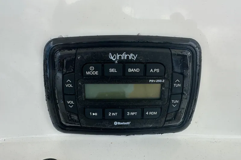 Slide: The Image of Infinity PRV-250.2 marine stereo on 2019 NauticStar 2302 Legacy boat dashboard. - 5