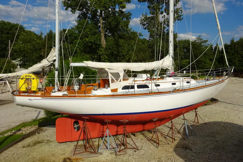 The Image of 1970 Hinckley Bermuda 40 Custom sailboat on stands, with white hull and red keel. - 0