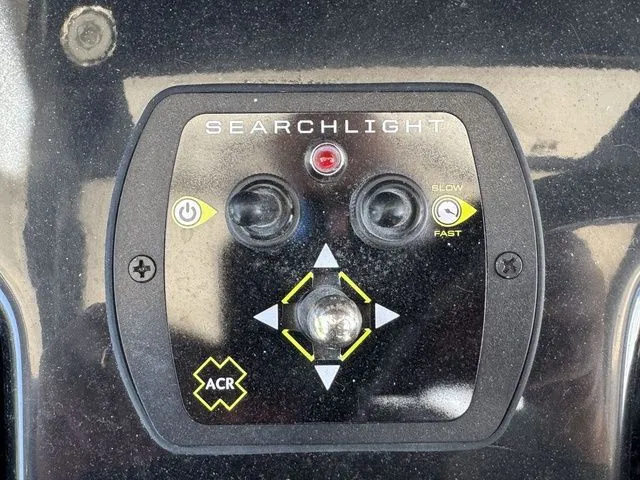 Slide: The Image of Control panel for searchlight on 2026 Robalo R360 Center Console boat. - 18