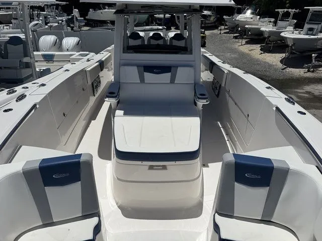 Slide: The Image of 2026 Robalo R360 Center Console boat with spacious seating and sleek design. - 32