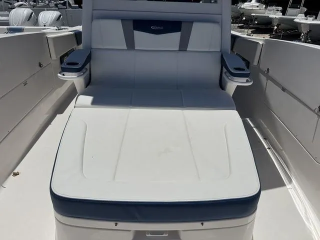 Slide: The Image of 2026 Robalo R360 Center Console boat interior with cushioned seating. - 33