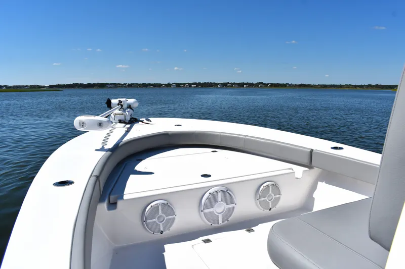 Slide: The Image of 2023 Xplor X24 boat speeding on water at sunset. - 7