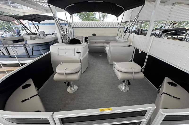 Slide: The Image of 2026 Sweetwater 2086FX pontoon boat with spacious seating and modern design. - 2