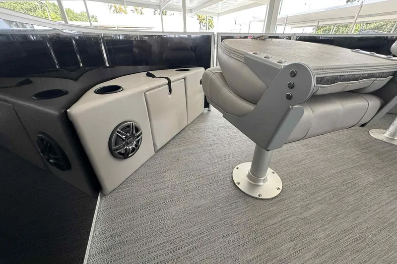 Slide: The Image of Interior of 2026 Sweetwater 2086FX boat with seating and speaker system. - 3