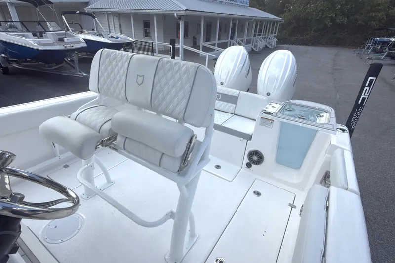 Slide: The Image of 2026 Sea Fox 268 Commander boat interior with dual engines and luxury seating. - 12